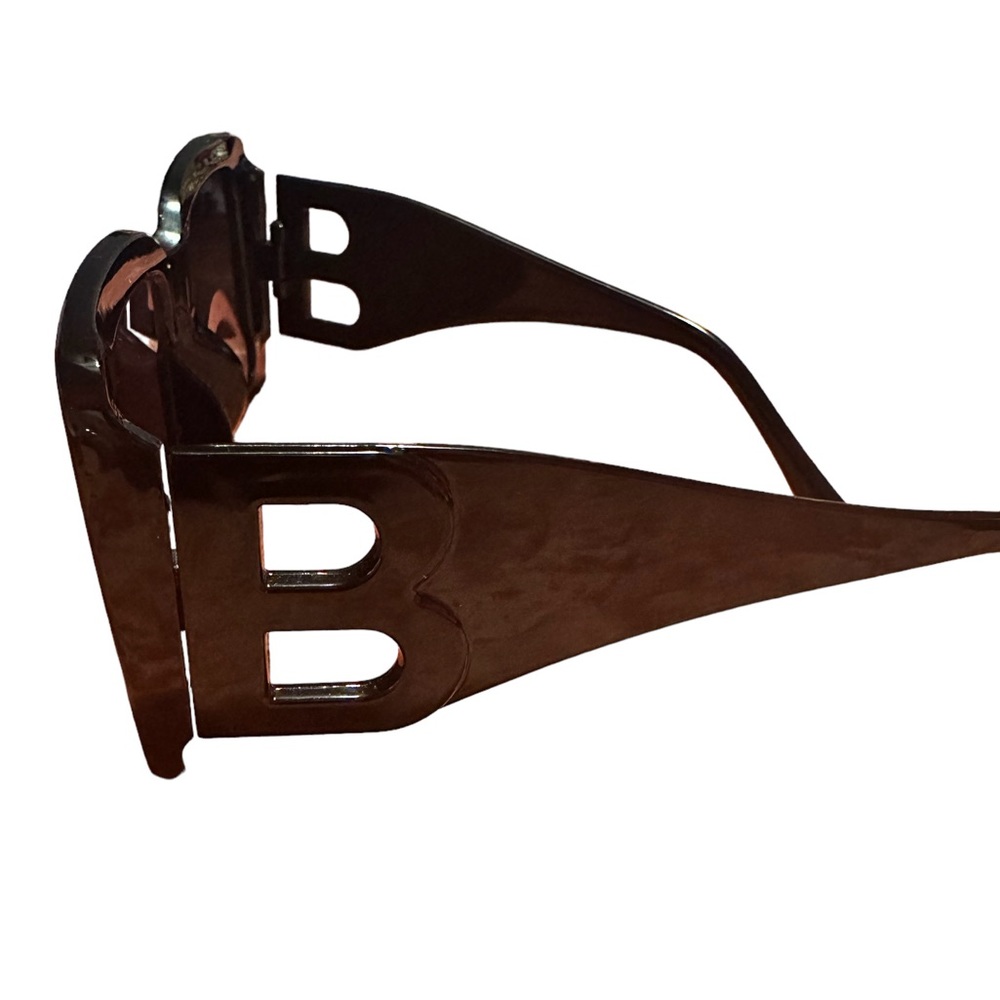 B Sunglasses black frame.  Very good copy.